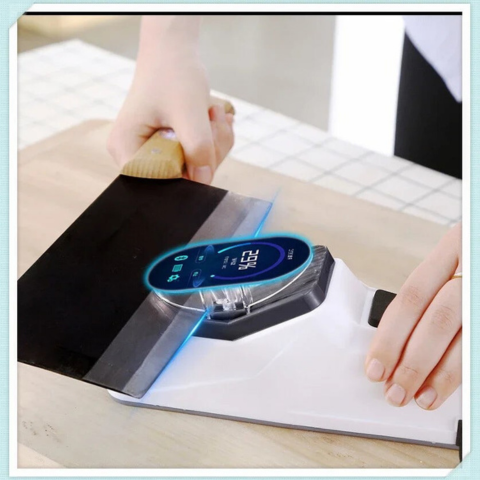 L' AFFUTEUR DE COUTEAUX